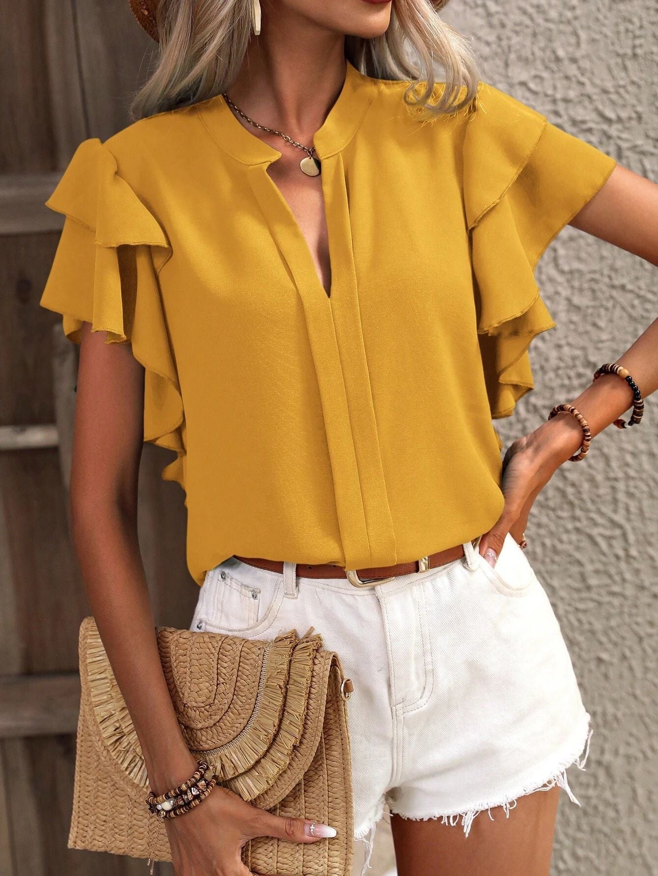 Women's blouse with decorative ruffle details and elegant V-neck, size [size missing]