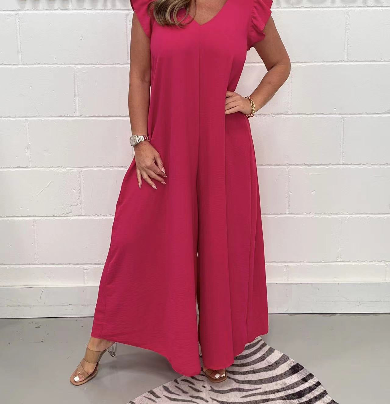 Women's upscale jumpsuit with voluminous ruffled sleeves and V-neck, size S