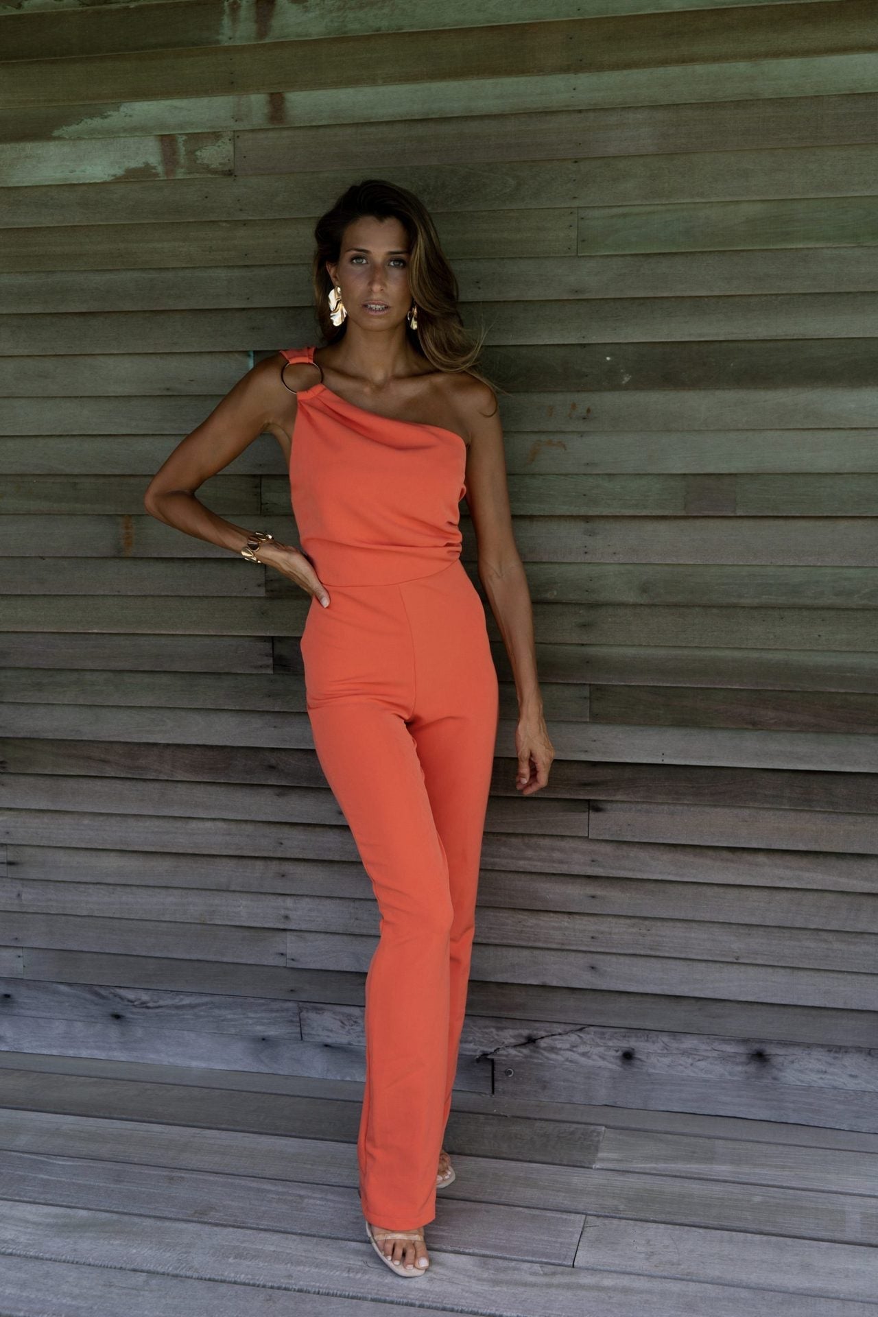 Women's stylish jumpsuit with an asymmetrical cut and elegant details, size [size missing]