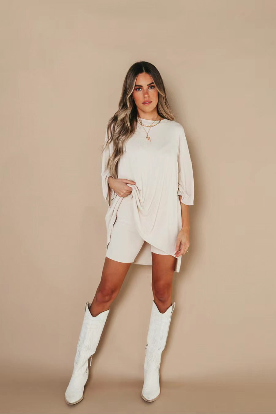 Women's comfortable oversized blouse with deep V-neck, size