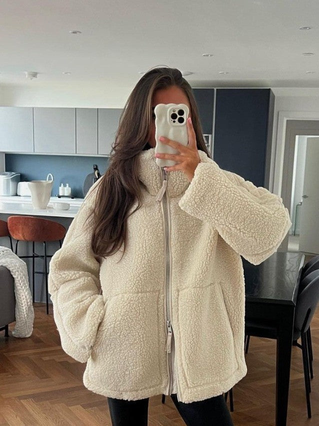 Women's cozy fleece jacket with high collar and practical pockets, size