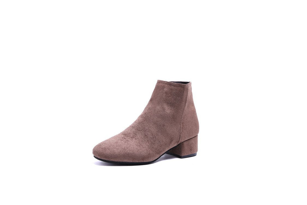 Women's ankle boots with a modern, minimalist design and comfortable block heel, size GR