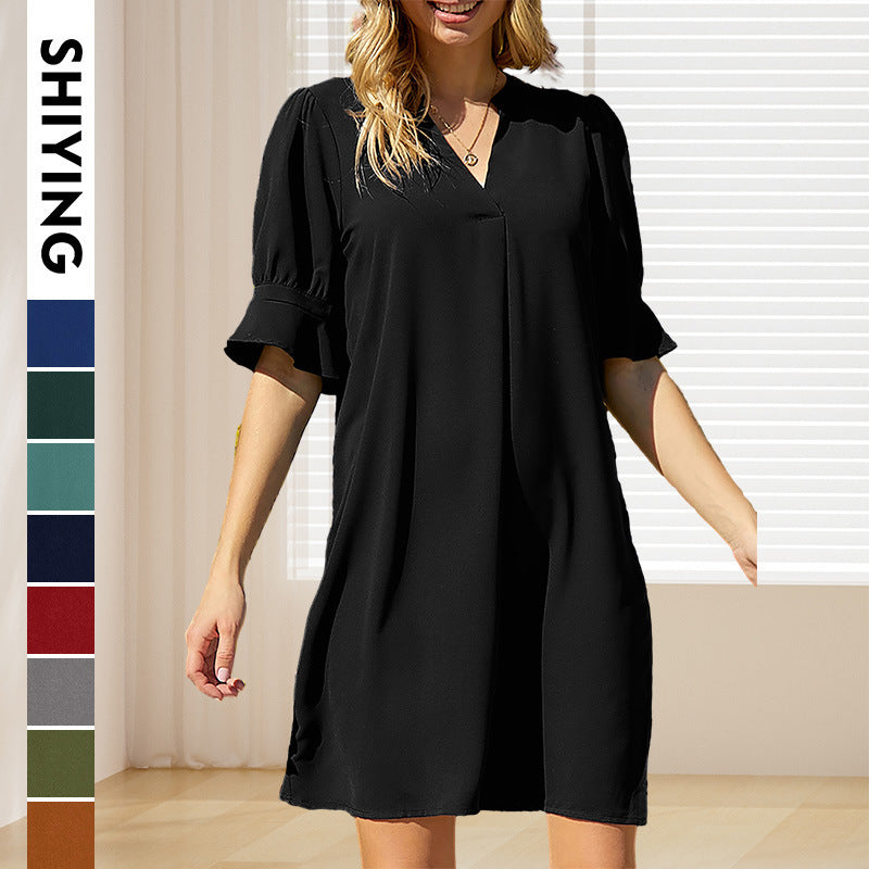 Women's elegant mini dress with a flattering V-neck and puff sleeves, size S