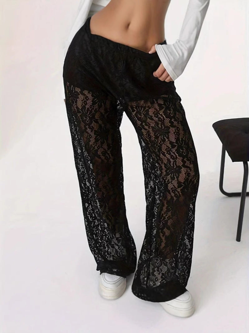 Women's elegant lace trousers with a wide cut and elasticated waistband, size