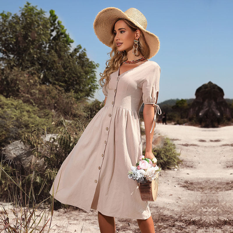 Women's knee-length summer dress with V-neck and romantic button details, size