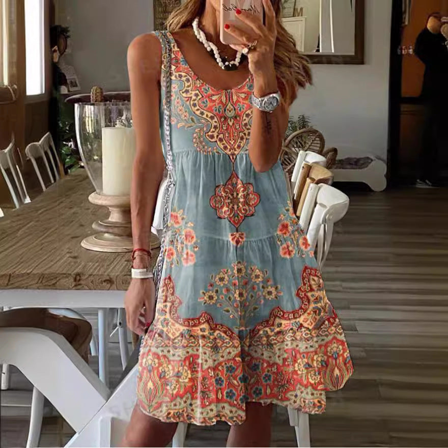 Women's summer tunic dress with floral patterns and a flowing skirt, size S