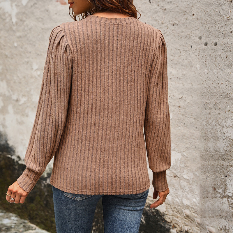 Women's knit sweater with elegant ruffle details and textured fabric, size S