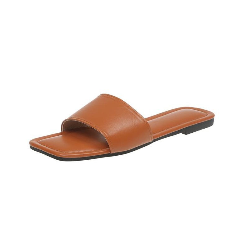 Women's open toe-post mules with an elegant design, size S