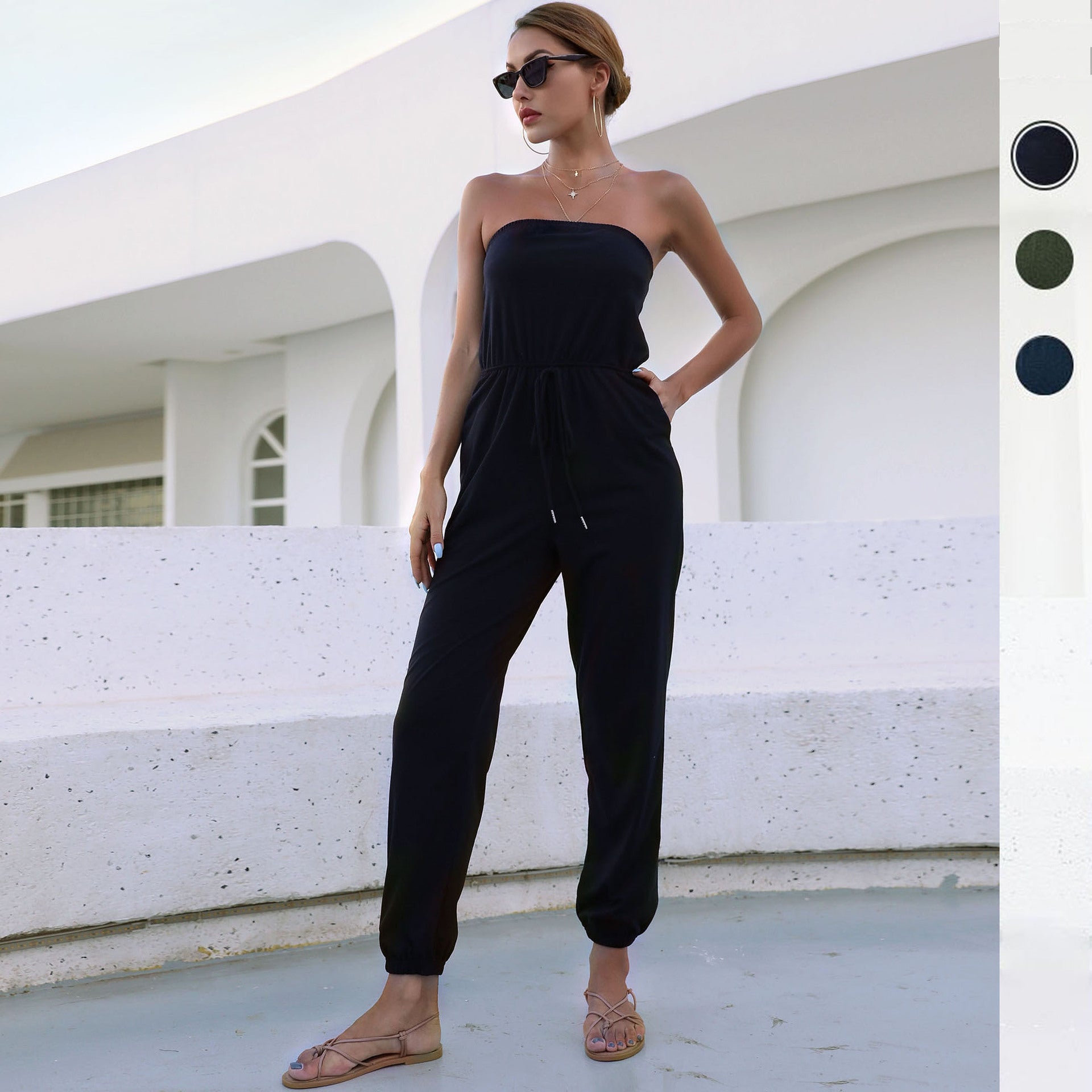 Women's jumpsuit with strapless design and elastic waist belt, size
