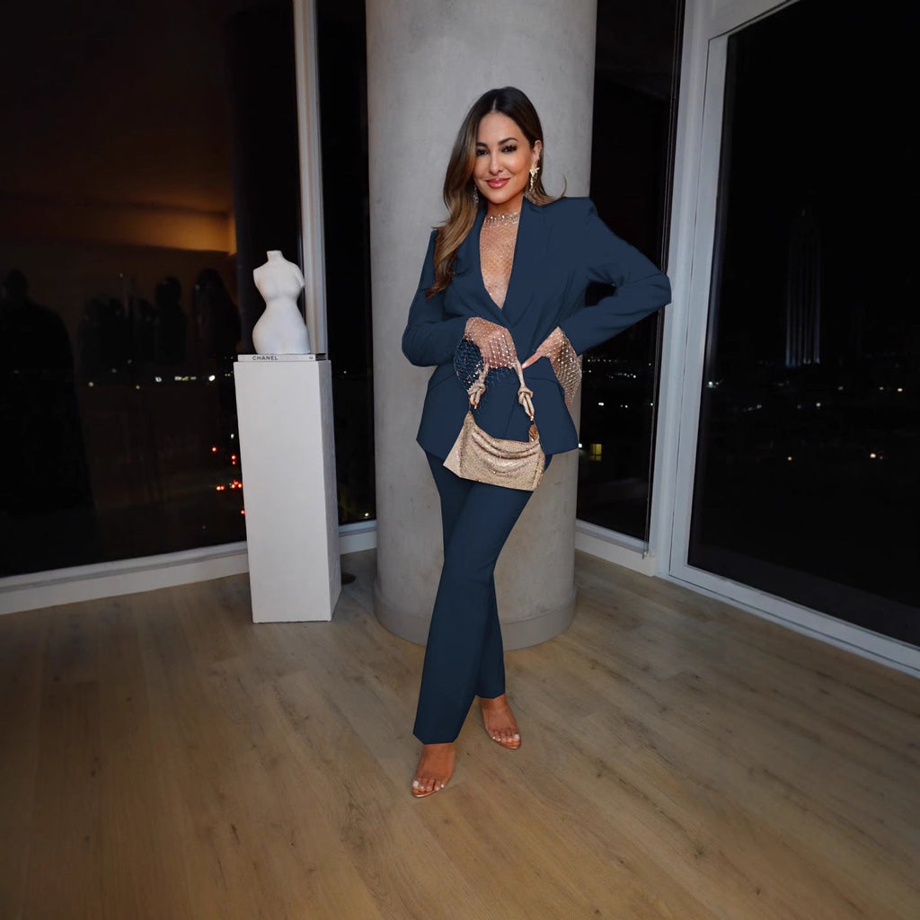 Women's elegant blazer and trouser suit with a chic cut, size
