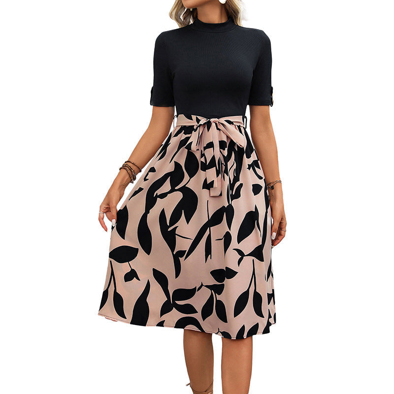 Women's midi dress with elegant floral cut and waist belt, size