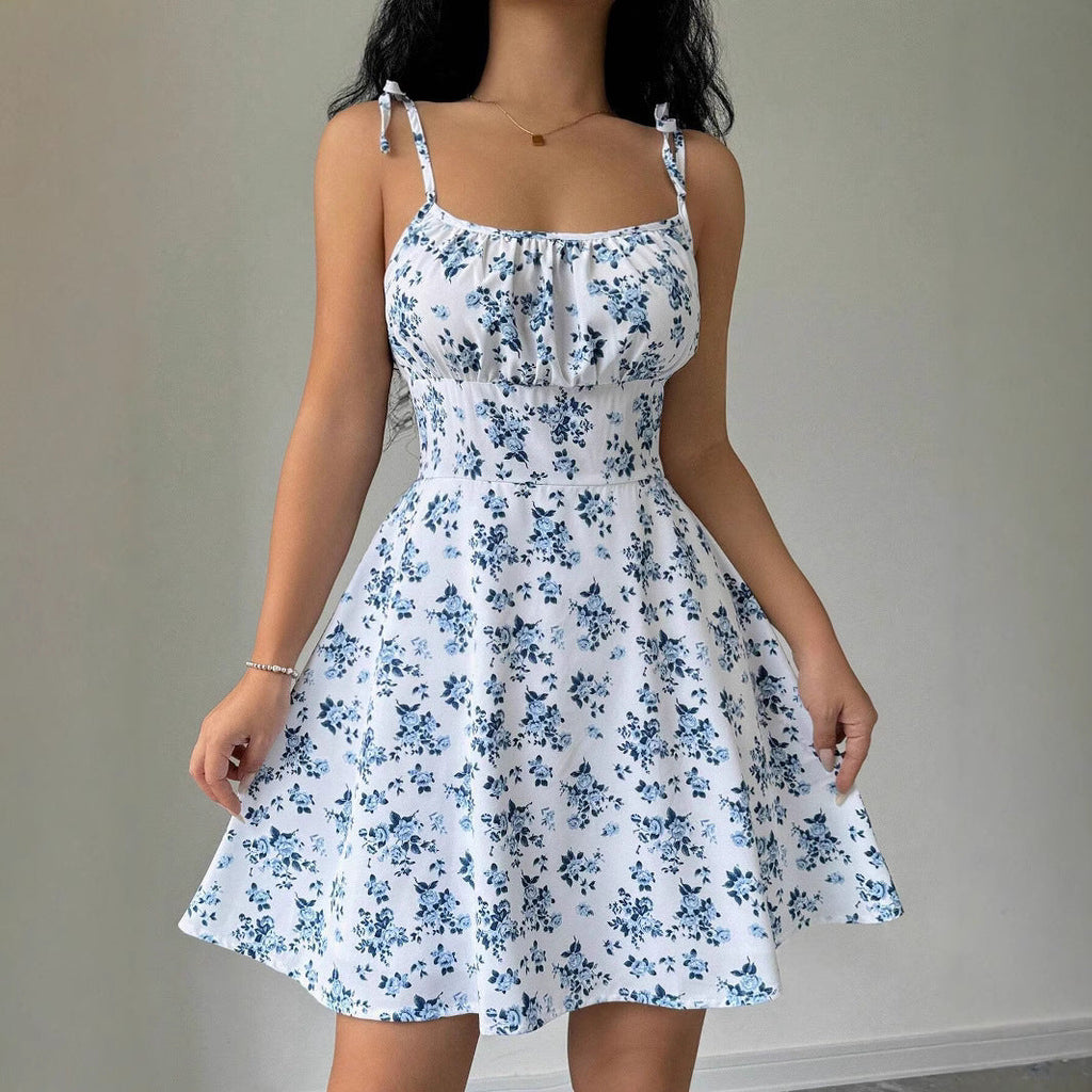 Women's summer dress with adjustable spaghetti straps and floral accents, size [size missing]
