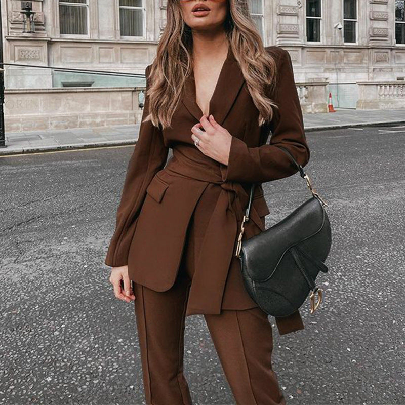 Women's blazer suit with tailored cut and elegant belt, size