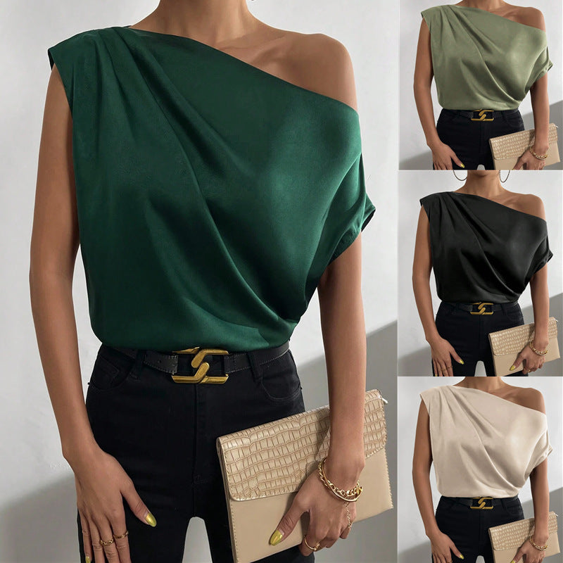 Women's asymmetrical top with draping and elegant cut, size
