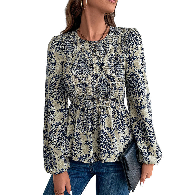 Women's blouse with elegant ruffle seams and floral pattern, size S