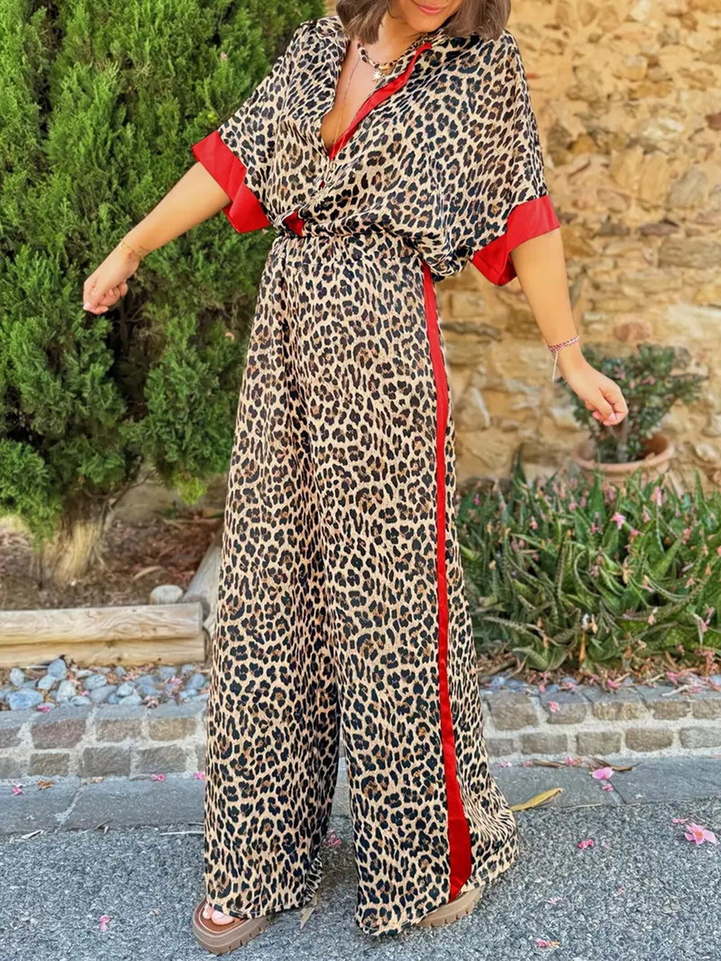 Women's elegant and comfortable linen jumpsuit with leopard print and contrast stripes, size S