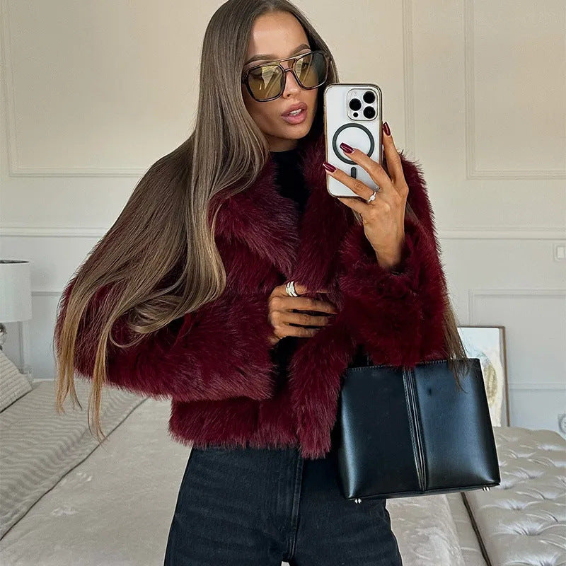 Women's faux fur jacket with a voluminous collar and elegant cut, size S