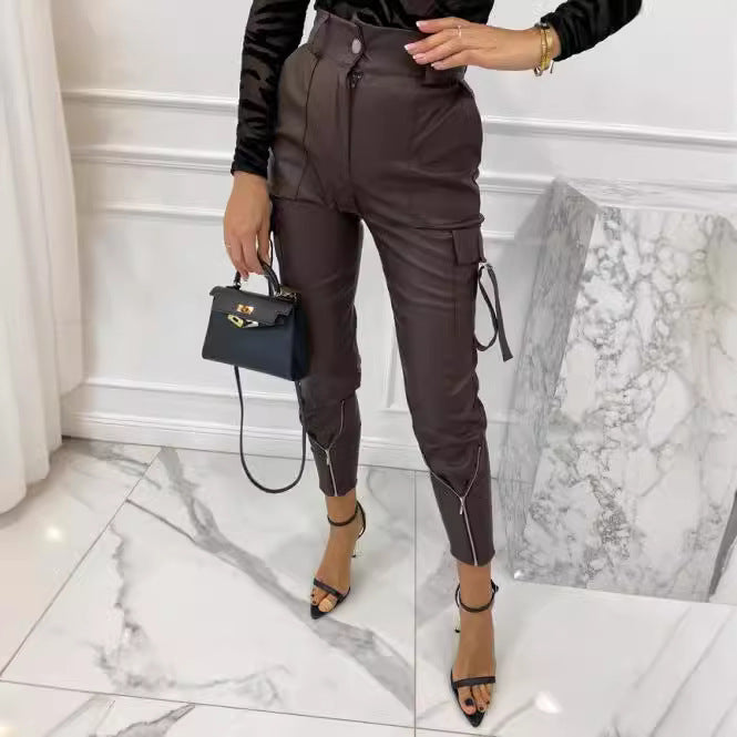 Women's waterproof faux leather cargo pants with zippers and adjustable cuffs, size