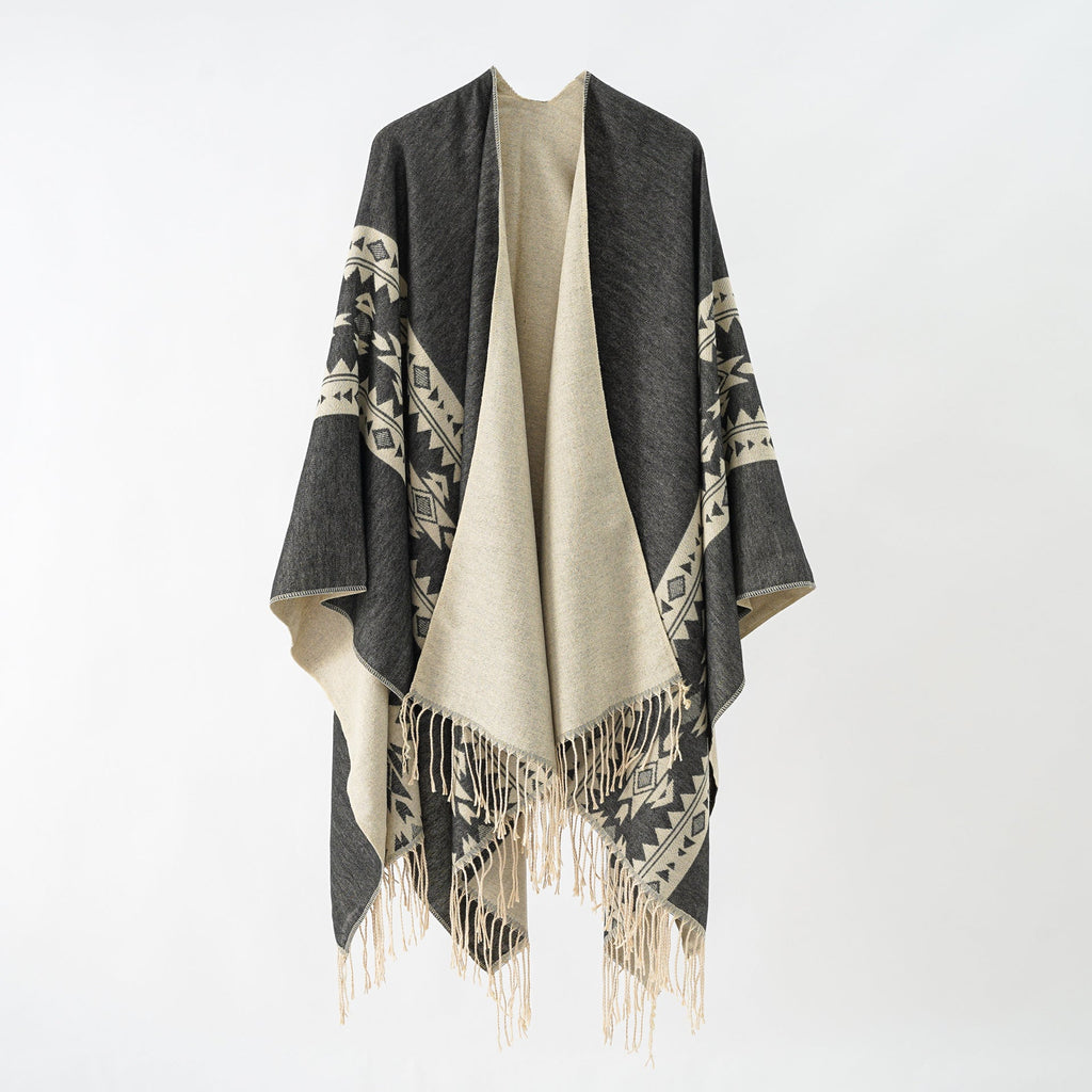 Damen eleganter Strickponcho mit kunstvollen Fransen und floralen Akzenten GR