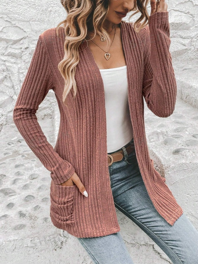 Women's fine knit cardigan with deep V-neck and practical pockets, size