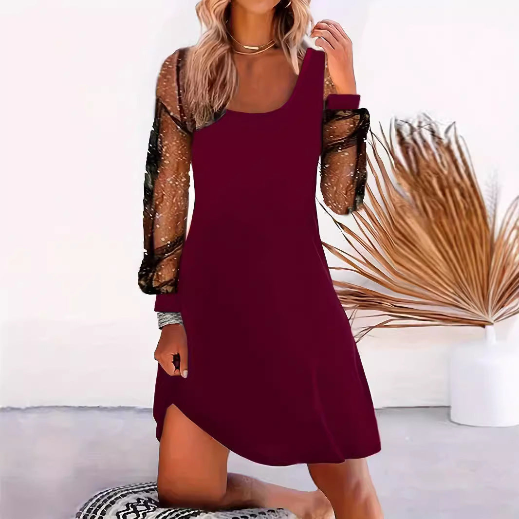 Women's asymmetrical dress with sheer puff sleeves and shimmering accents GR