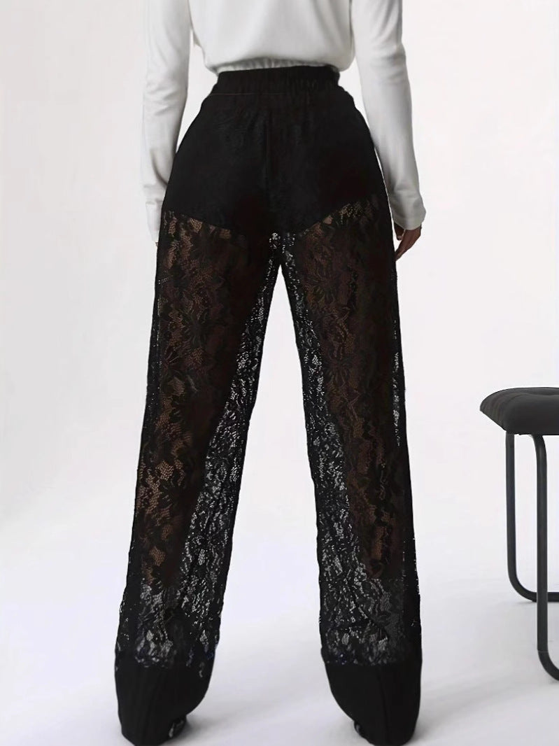 Women's elegant lace trousers with a wide cut and elasticated waistband, size