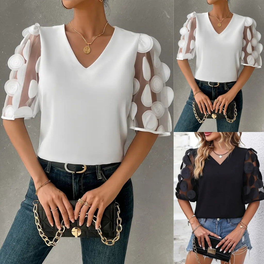 Damen Bluse mit transparenten Puffärmeln und eleganten Detail GR