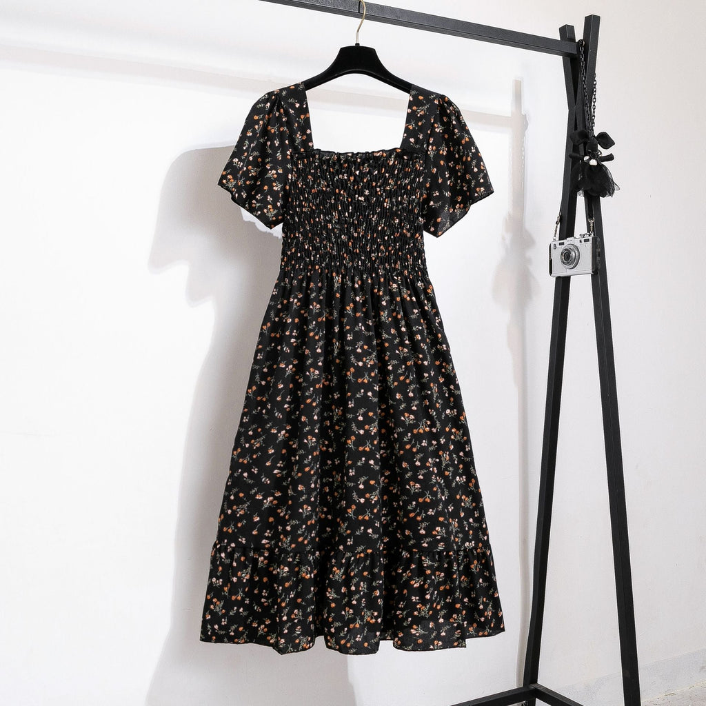 Women's floral print midi dress with elasticated waist and voluminous skirt, size [size]