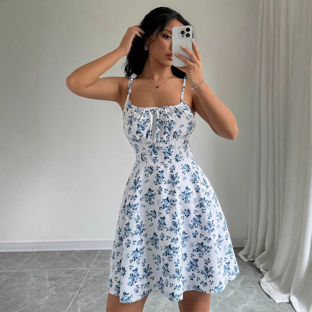 Women's summer dress with adjustable spaghetti straps and floral accents, size [size missing]