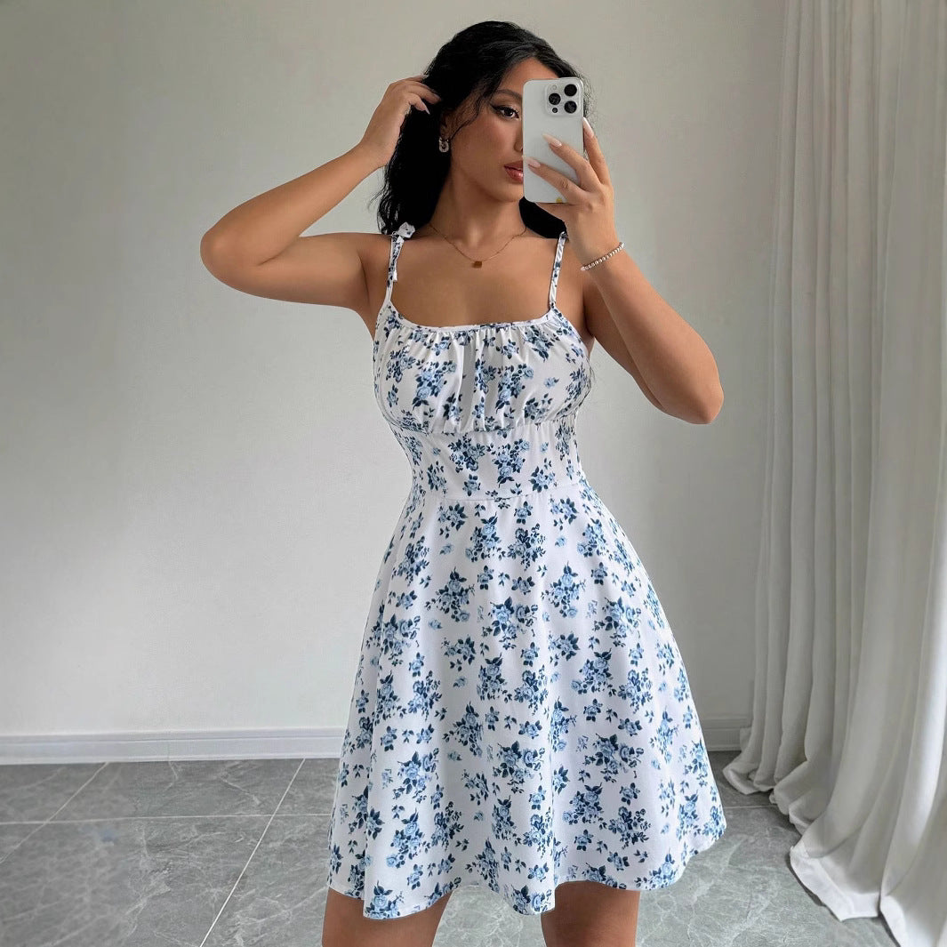 Women's summer dress with adjustable spaghetti straps and floral accents, size [size missing]