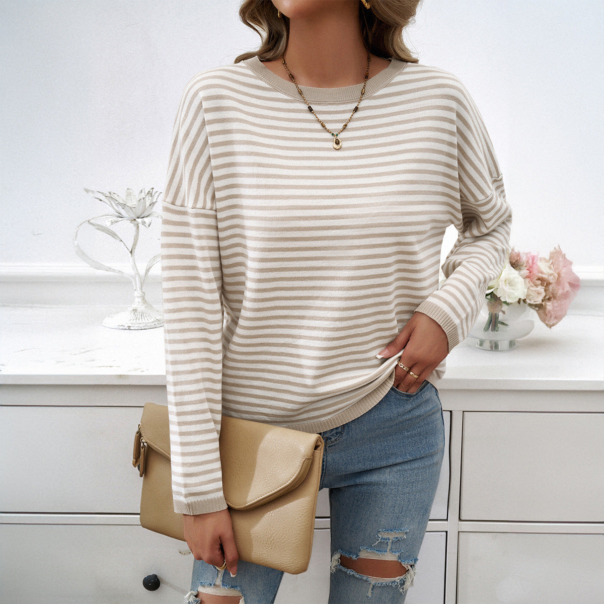 Women's casual striped sweater with colored accents, size