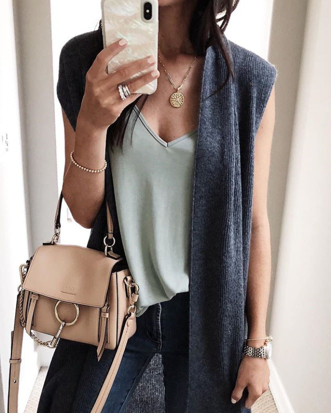 Women's open cardigan with a relaxed fit and long side panels, size