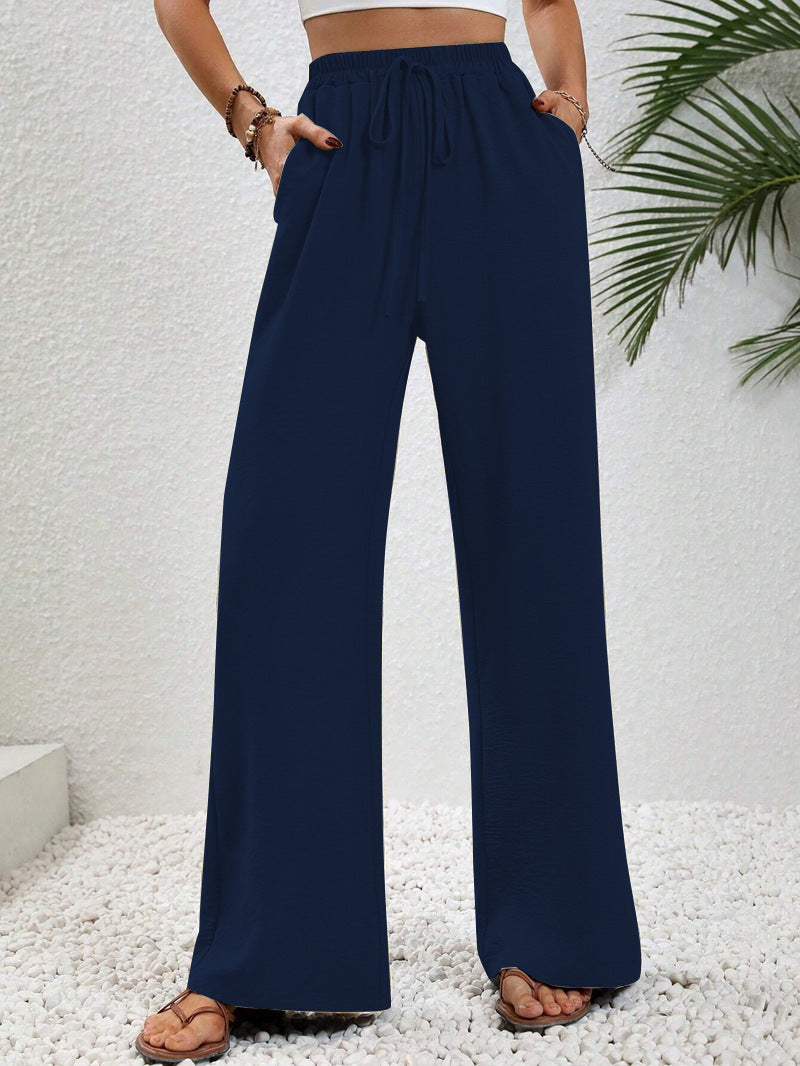 Women's casual, wide-legged leisure trousers with elasticated waistband and side pockets, size S