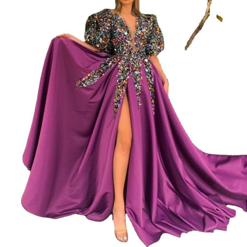 Women's glamorous evening dress with voluminous puff sleeves and sparkling neckline GR