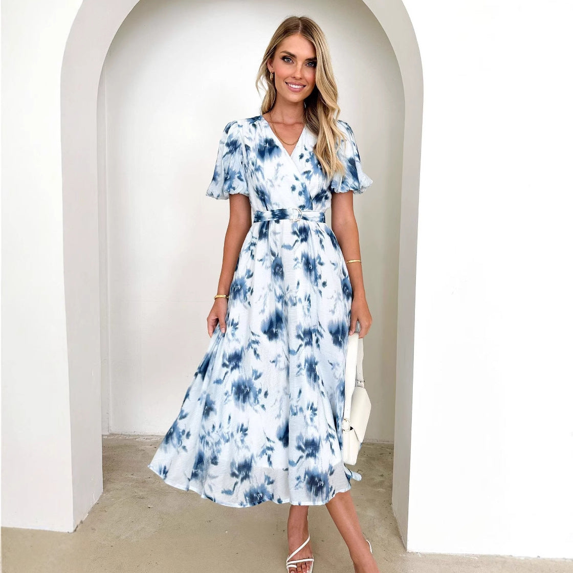 Women's midi dress with a fitted cut, voluminous sleeves and an elegant wave pattern, size GR