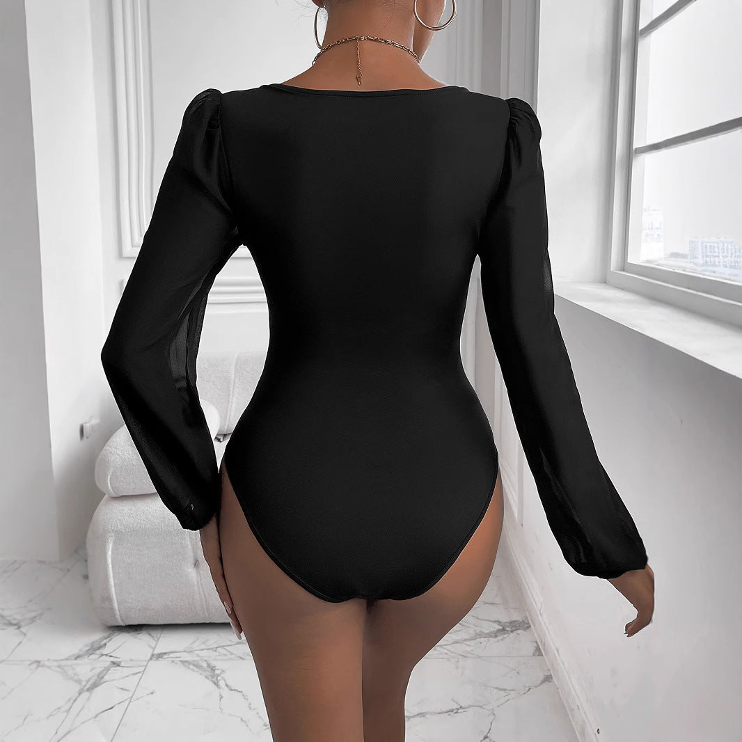Women's bodysuit with deep V-neck and transparent puff sleeves, size