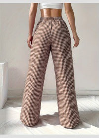 Women's wide-leg checked trousers with elasticated waistband and chic cut, size [size]