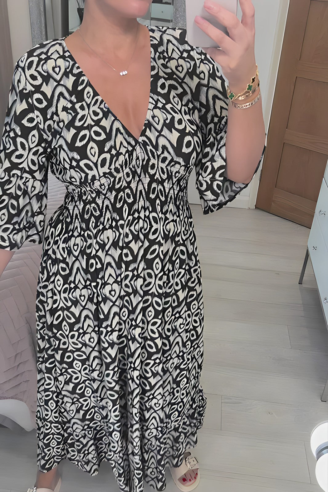 Dress with 3/4 sleeves and pattern