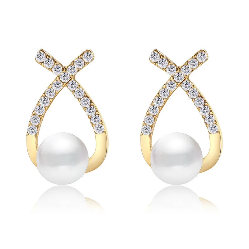GR | Gold-colored pearl stud earrings