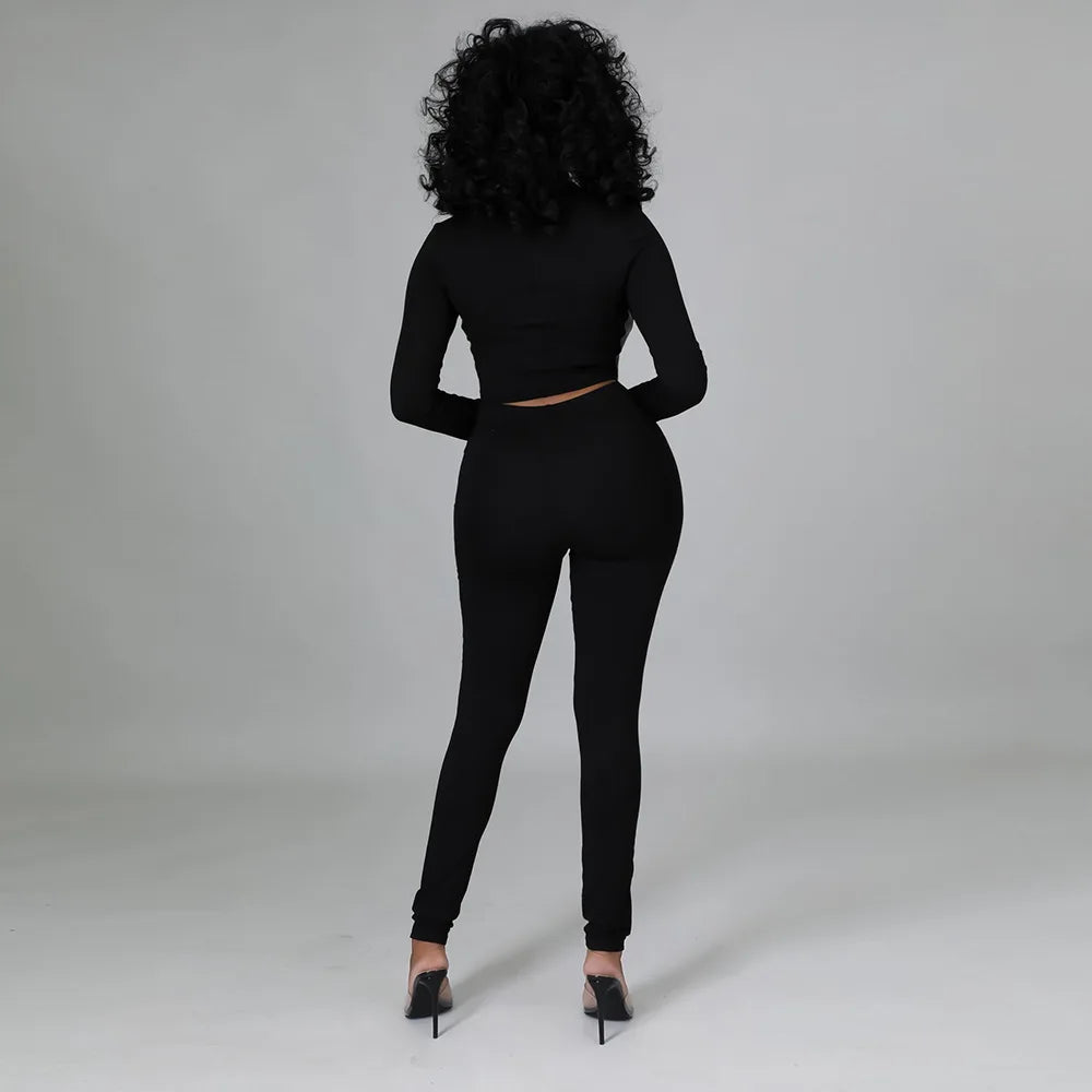 GR | Two-piece set with short faux leather corset and high-waisted trousers