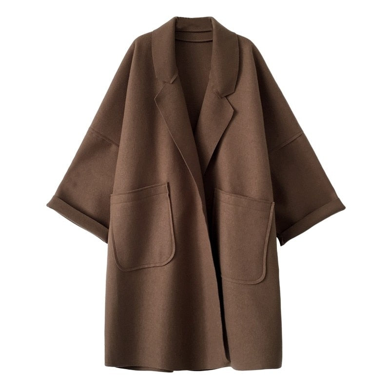GR | Elegant, loose-fitting wool trench coat for