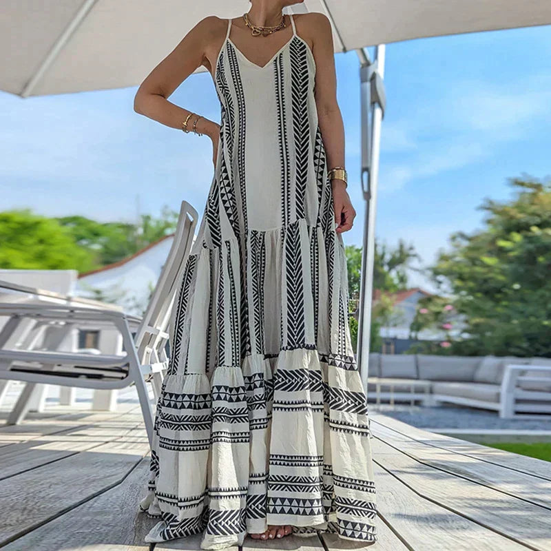 GR | Elegant dress, sleeveless, with ruffle and casual print