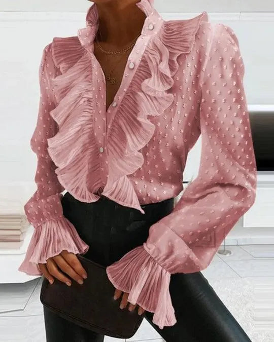 GR | Blouse with ruffles and long sleeves.