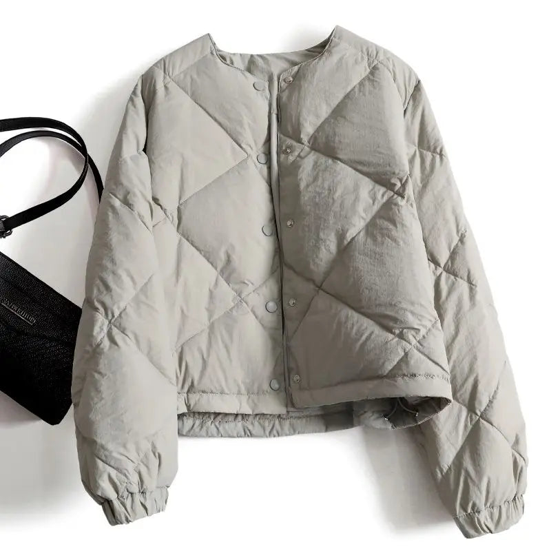 GR | Lightly padded jacket with snap button closure