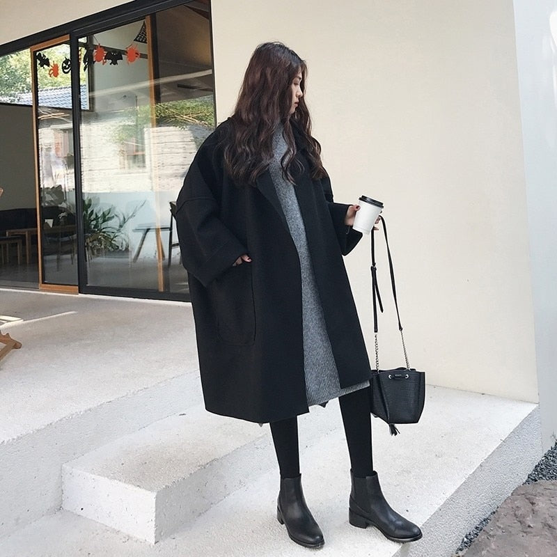 GR | Elegant, loose-fitting wool trench coat for