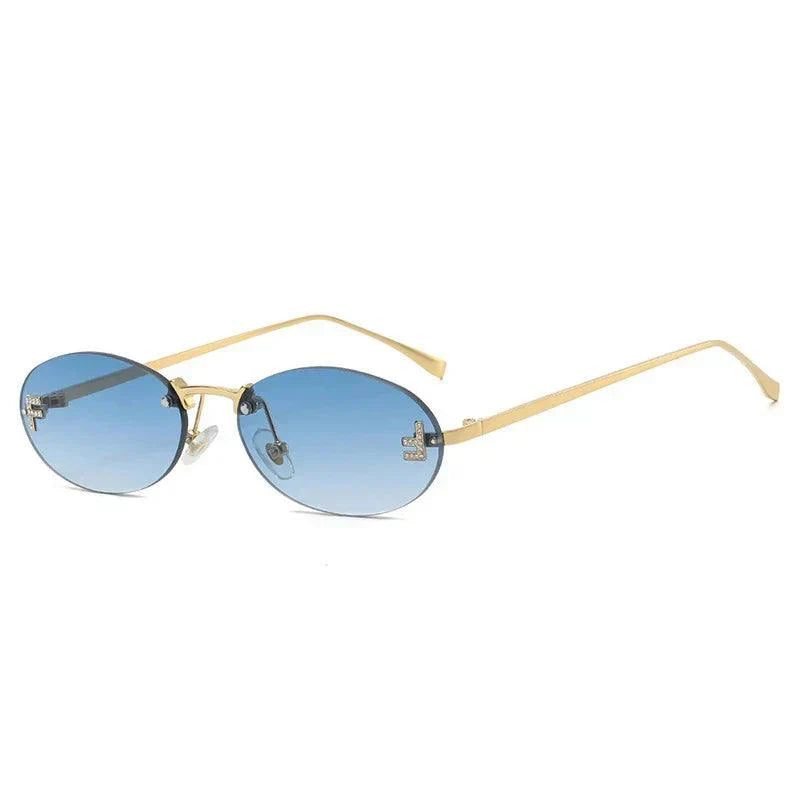 GR | Oval sunglasses with golden accents and subtle stones
