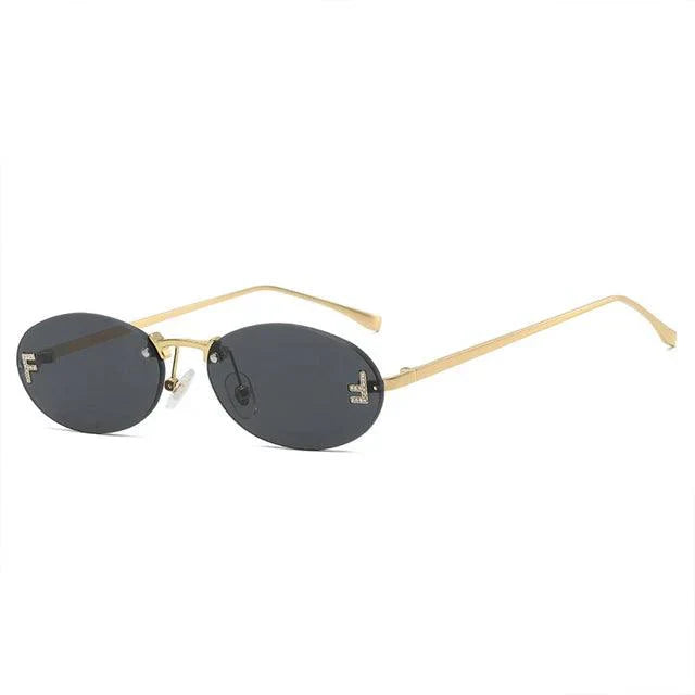 GR | Oval sunglasses with golden accents and subtle stones