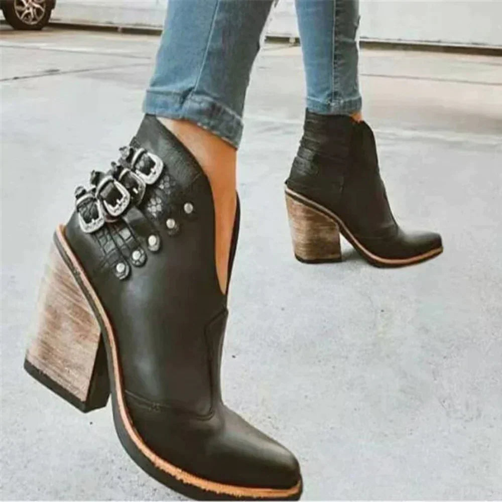 Boots with studs and a thick buckle