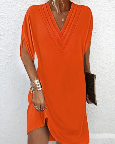 Elegant dress with slit sleeves