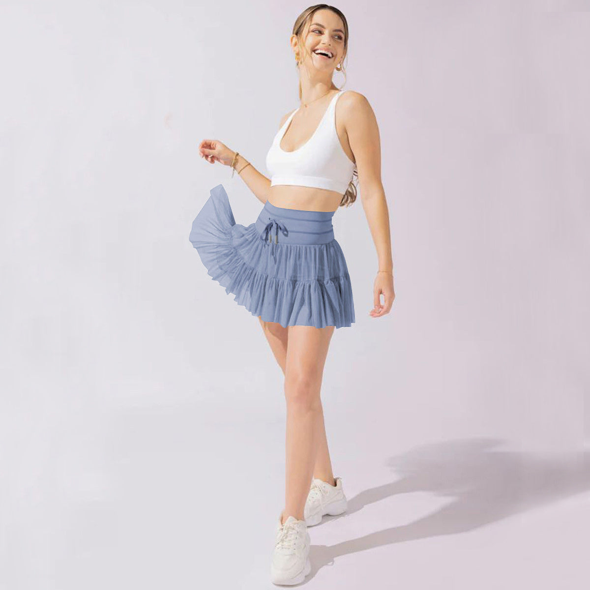 GR | High-waisted mini skirt with safety shorts
